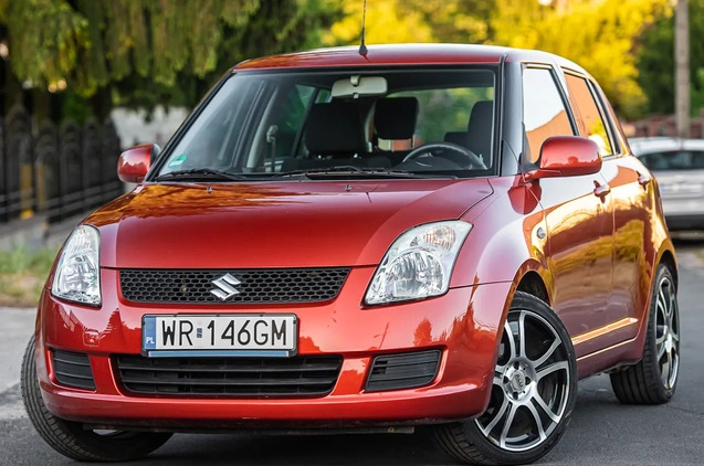 Suzuki Swift cena 18900 przebieg: 136000, rok produkcji 2009 z Rymanów małe 407